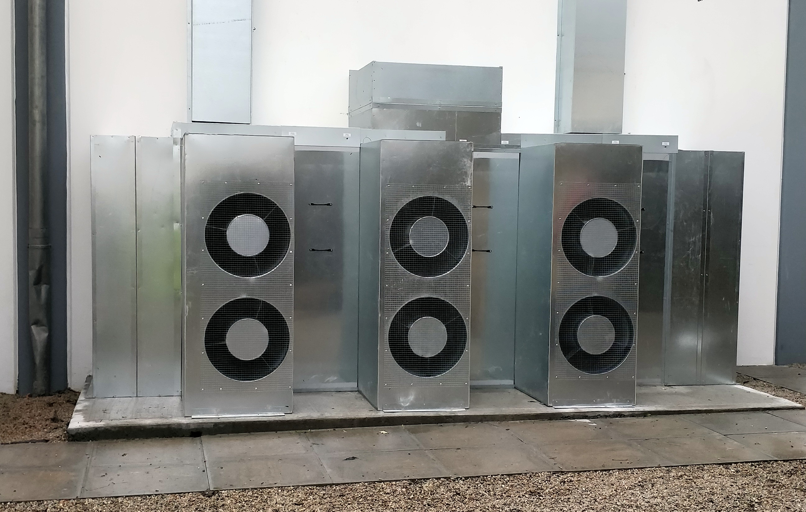 Wall-attached enclosure fitted to Toshiba splits